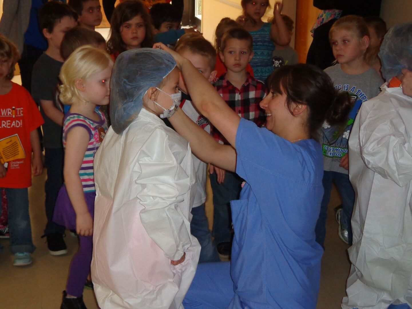 nurse dressing up a kid